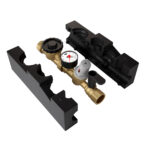 Exploded view of a pre-assembled brass water meter assembly with pressure gauge, pressure reducing valve, isolation valve and black insulation casing sections removed to show internal components.